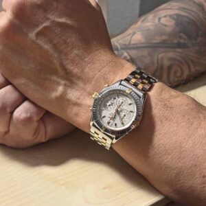 Breitling Shadow Flyback Chronomat in 38 mm Stahl/Gold LC100 Fullset neuer Service